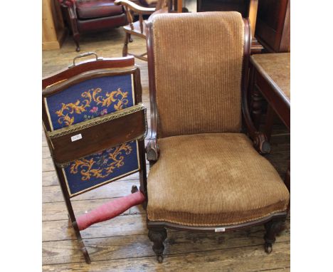 A late 19th Century mahogany fire screen with woodwork panel and hinged shelf and a late 19th Century mahogany framed lady's 