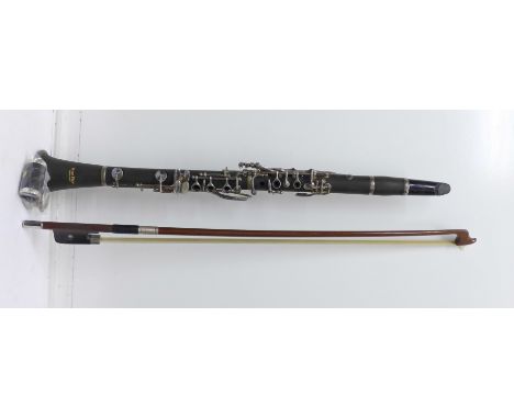 A double bass bow and an Ever Play clarinet