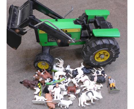 A Tonka tractor and plastic toys including Britains