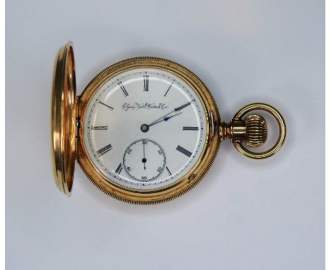   Elgin, Savonette  14 K Gelbgold. 3 Deckel-Gehäuse, beidseitig reich monogrammiert. Römische Stundenzahlen auf Emaille-Ziffe