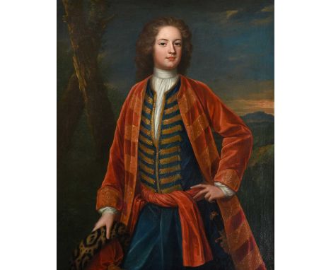 Circle of Charles Jervas (c.1675-1739) IrishPortrait of a gentleman, three-quarter length wearing a sumptuous red coat decora