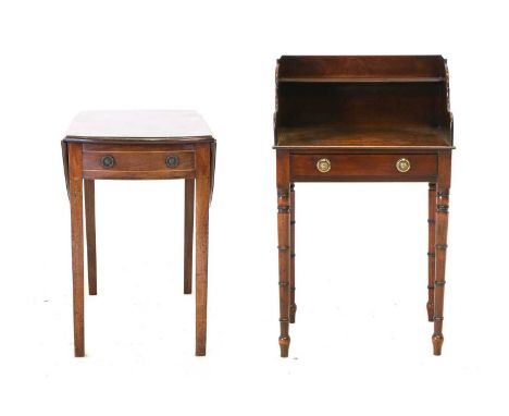 A George III Mahogany Pembroke Table, circa 1800, with two dropleaves to form an oval above an oak-lined drawer, on square ta