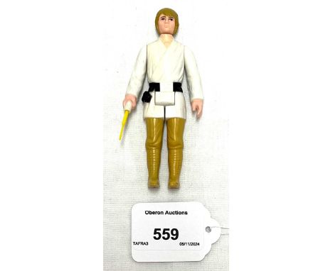 Kenner vintage Star Wars Luke Skywalker (light brown hair) 3 3/4" figure, Good Plus complete.