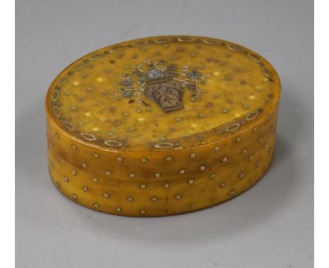 A late 18th century French yellow and white metal pique oval horn snuff box, 74mm.