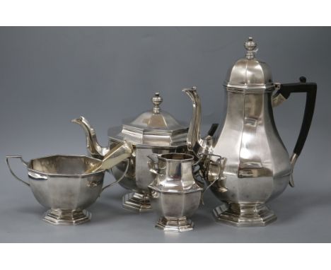 An Edwardian 18th century style four piece silver tea and coffee service by Thomas Bradbury &amp; Sons, London, 1904, and a p