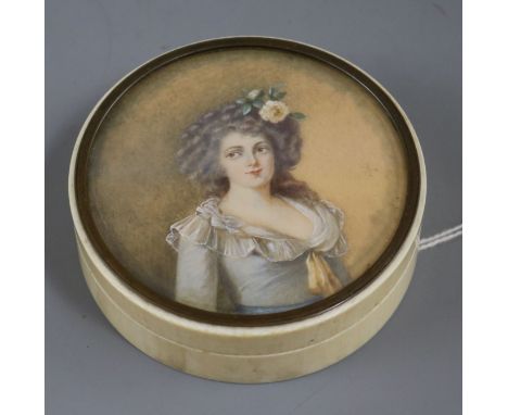 A 19th century ivory snuff box with painted lid