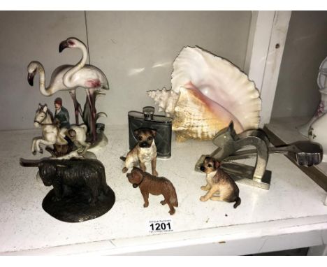 A mixed lot of animals including metal squirrel, nut cracker, hip flask &amp; coral shell (flamingo's are A/F)