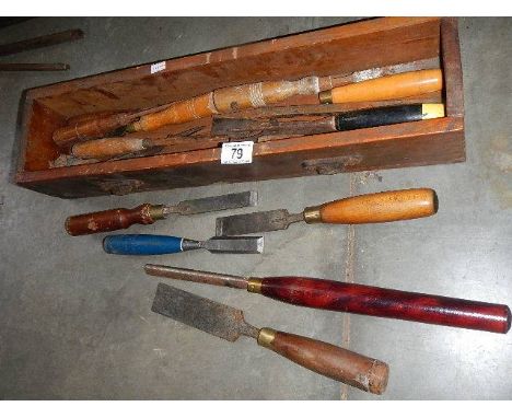 A tray of tools including wood turning chisels.