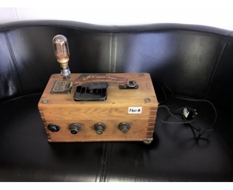 A Second world war power line circuit maker converted in to a lamp, with amp meter and dined GPO and with British military ar
