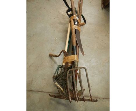 A quantity of garden tools.