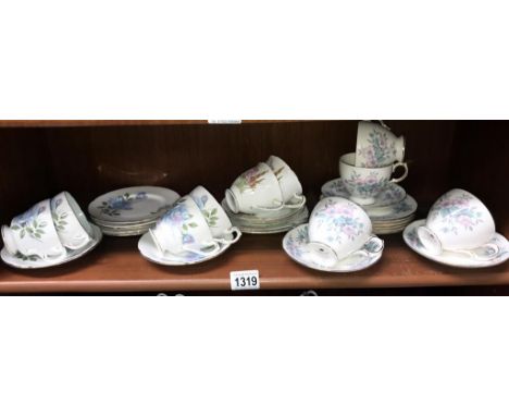 A Colclough 12 piece tea set (2 cups &amp; saucers stained) &amp; 11 pieces of Paragon