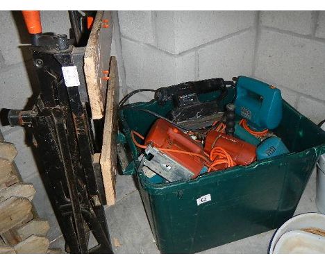 A box of assorted power tools, sold as seen.