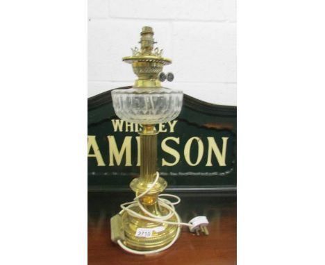 A brass and glass table lamp base ( formerly and oil lamp).