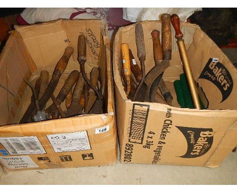 Two boxes of old tools.