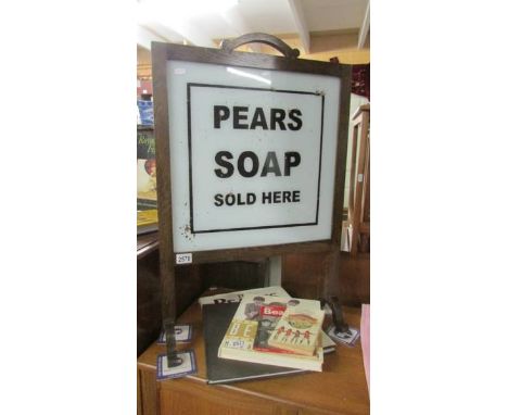 An oak firescreen with Pear's soap signage. ****Condition report**** It is reverse painted on glass with some flaking paint l
