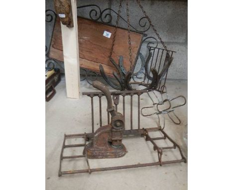 A mixed lot of metal ware including woodpecker door knocker, horse shoe hanging basket etc.,