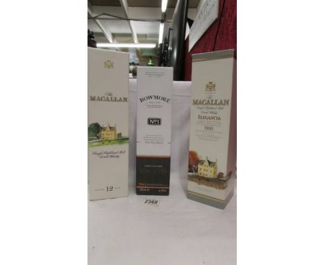 Three bottles of whisky - 2 x Macallan single highland malt scotch whisky and Bowmore Islay single malt scotch whisky.
