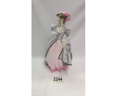 A Royal Worcester figurine 'Masquerade'.