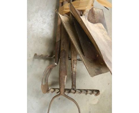 A quantity of garden tools.