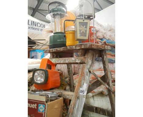 A small wooden step ladder.