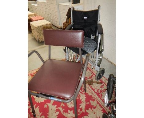 A wheel chair and a commode.