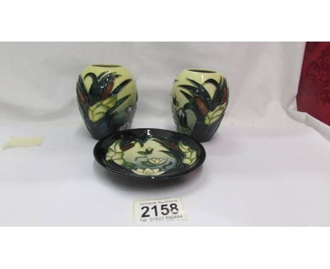 Two Moorcroft 4" lamia vases and and a lamia pin dish. ****Condition report**** All 3 pieces in good condition but factory se