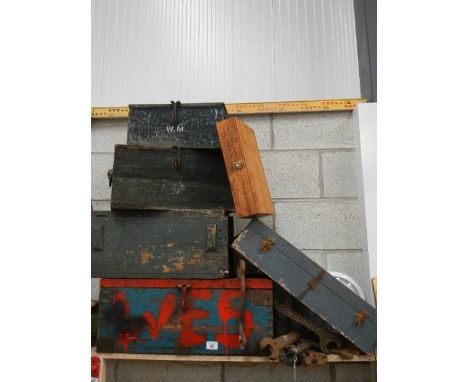 Six wooden tool boxes and a quantity of large spanners.