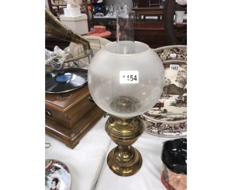 A Veritas brass oil lamp