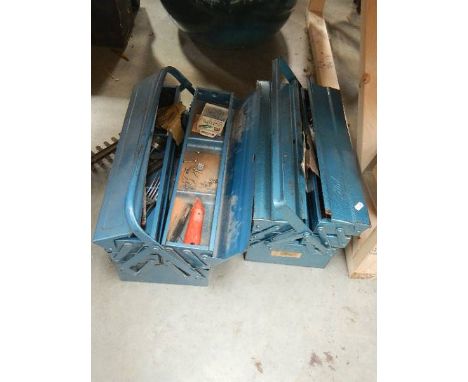 Two good metal tool boxes with tools.