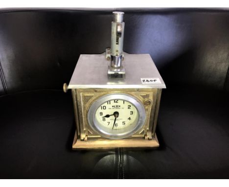 A mid 20th century pigeon timer clock.