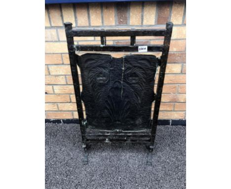 A 19th century Arts &amp; Crafts copper firescreen, punched and engraved with stylised flowers.