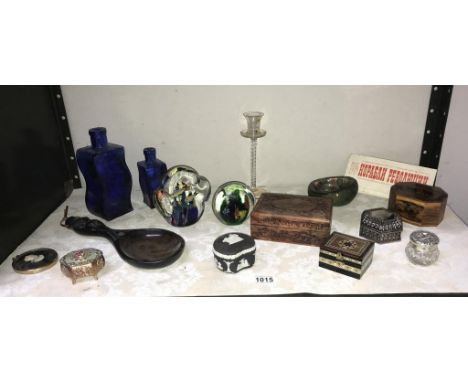 A shelf of miscellaneous including trinket boxes, black Wedgwood jasperware, paperweights etc