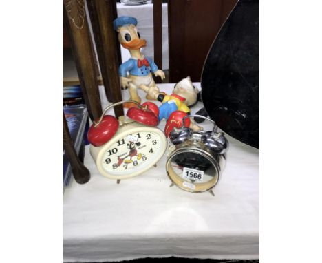 Vintage soft rubber Walt Disney Mickey Mouse (no tail) and Donald Duck plus Mickey Mouse alarm clock and Beatles alarm clock