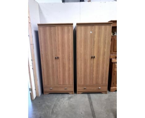 A pair of light oak effect melamine double door wardrobes with drawer, 81 x 53 x 182 cm high