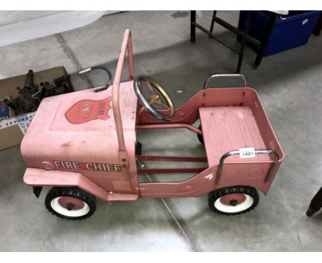 A vintage style Jeep Fire chief fire engine pedal car