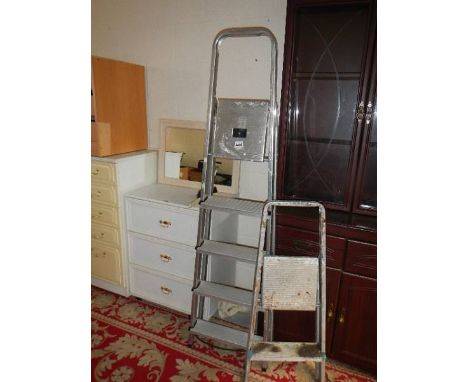 Two step ladders.