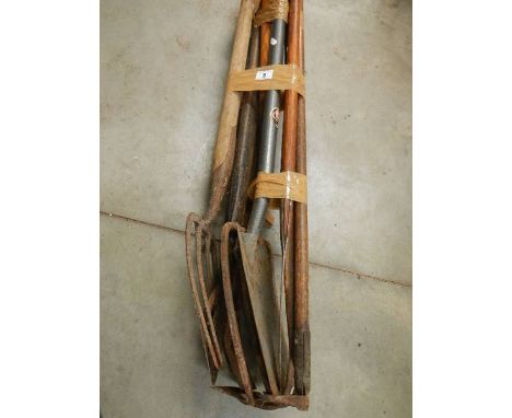 A quantity of garden tools.