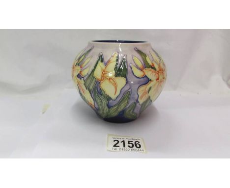 A Moorcroft small bulbous floral design vase (second). ****Condition report**** Factory second