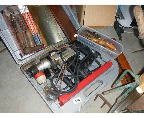 A kango hammer and other tools.