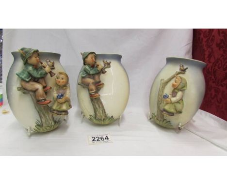 Three Goebel wall pockets.