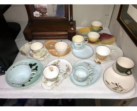 A quantity of vintage sandwich plates with cups