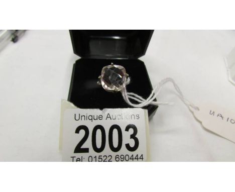 A rose quartz and silver ring, size R.