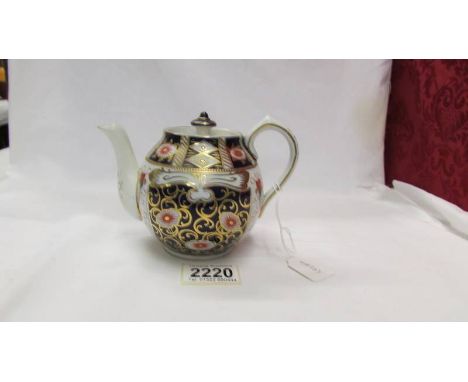 An early Macintyre Imari pattern teapot in good condition.