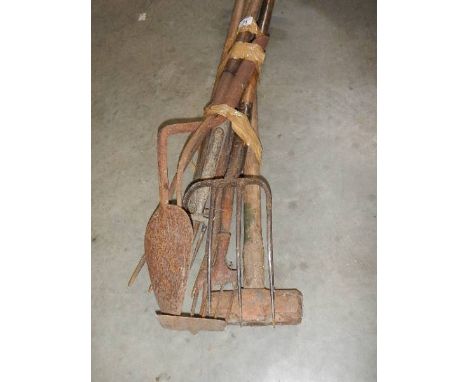 A quantity of garden tools.