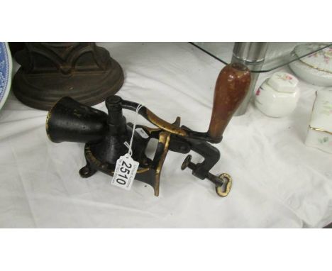 A Spong London coffee grinder. ****Condition report**** No.0, rust in places, no tray