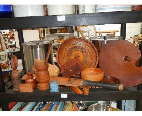 A shelf of old wooden items.