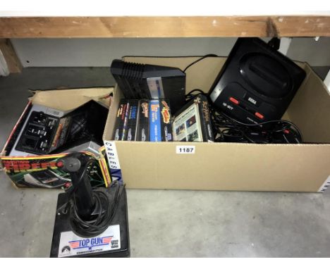 An Atari 2600 Sega MegaDrive II &amp; Top Gun thrust master joy stick (all untested)