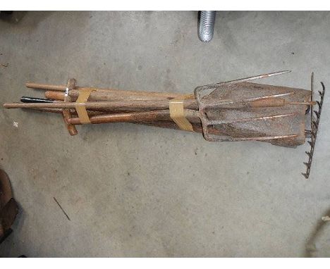 A quantity of garden tools.