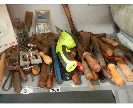 A shelf of tools etc.,