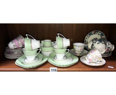 A Royal Couldon 10 piece set, Royal Stafford cups &amp; saucers x2, Heathcote art deco part tea set (12 pieces) &amp; 11 piec